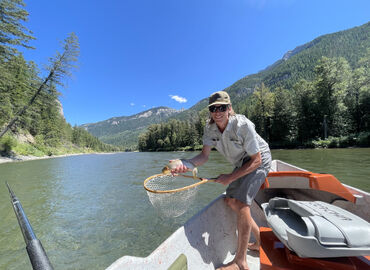 Fly fishing from a boat near Brooks Creek Ranch