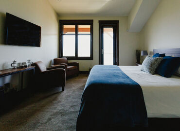 Brooks Creek Ranch room with natural bedding